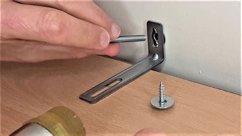 using metal l brackets to attach bookcase to walls|fixing bookcase to wall.